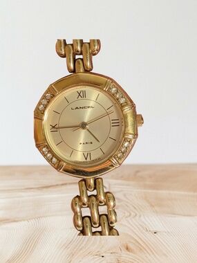 Lancel Paris Women's Gold-Tone Crystal Accent Bracelet Watch